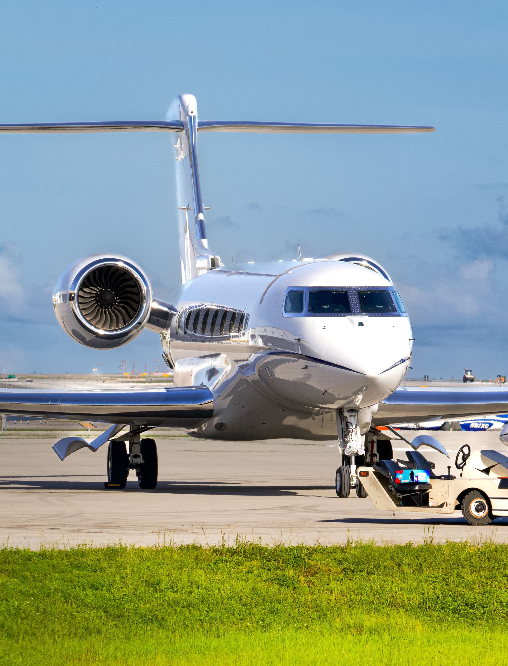 Private jet viewed from the front on an airport apron
